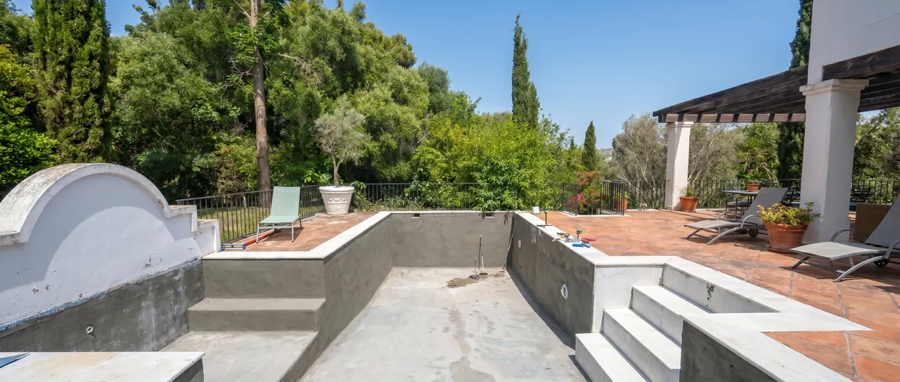 The Sotogrande garden pool before re-tiling.